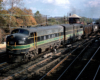 Color photo of two streamlined diesel locomotives with Reading Company freight train