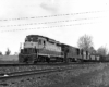 Black-and-white photo of two road-switcher diesel locomotives with Reading Company freight train