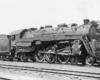 Black-and-white right-side photo of 4-6-2 steam locomotive at rest