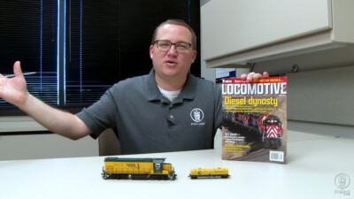 An Atlas coil car, Locomotive 2021 from Trains magazine, and an Athearn Genesis GP15-1 diesel locomotive. Plus a modeling tip and a big announcement!