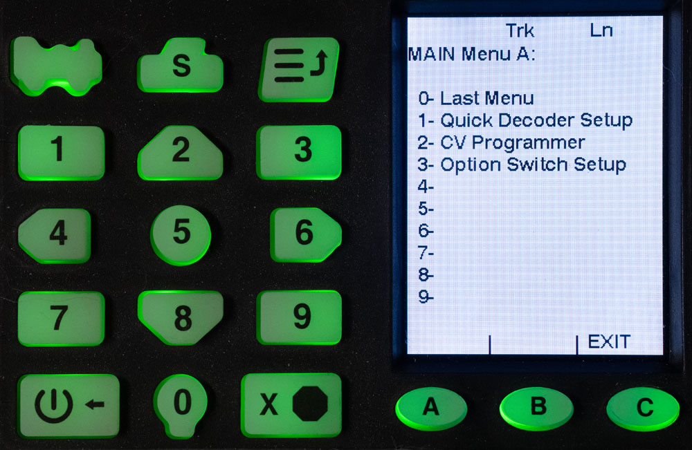 The keypad and display screen of a Digitrax DCC base station is seen during the process of programming a decoder.