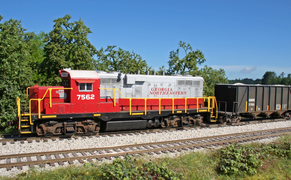A model diesel locomotive on a track