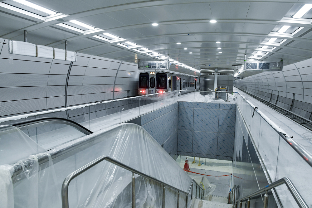 Commuter train in unfinished station