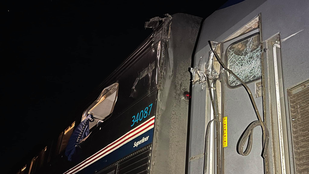 Damage to rear of locomotive and upper level of bilevel passenger car