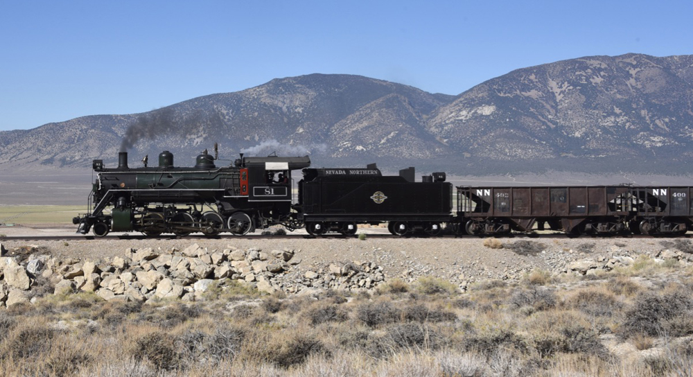 Steam engine in desert landscape