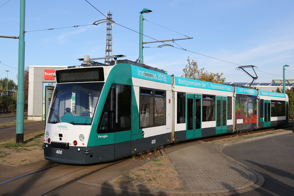 Green and white German streetcar