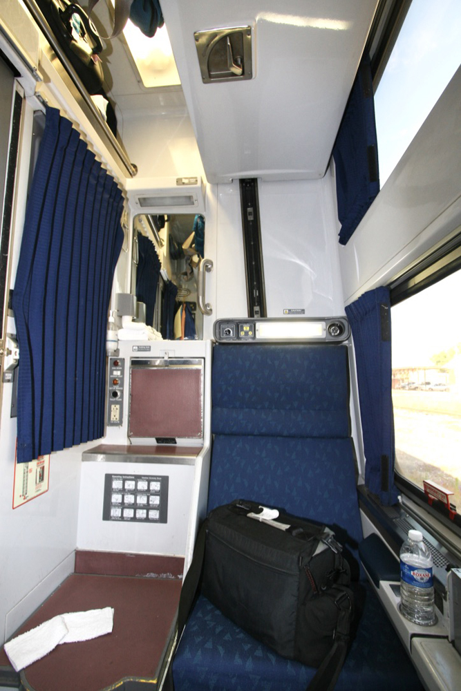 Interior of Viewliner sleeper, with bag storage space at top of roomette