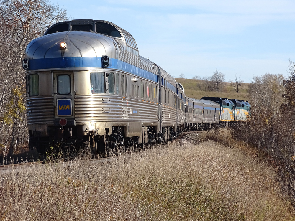 Stainless steel passenger train with dome-lounge-observation at rear