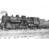 Steam locomotive standing in rail yard