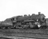 Steam locomotive standing in rail yard