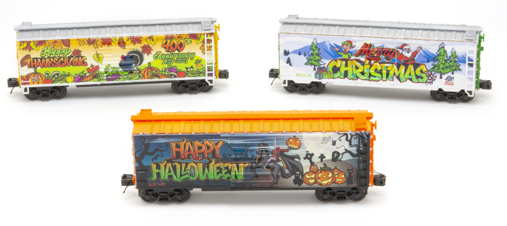 Three holiday boxcars