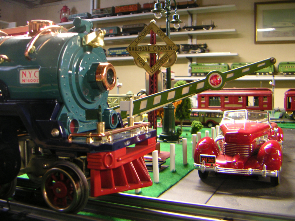 Close up of model Christmas steam engine on layout
