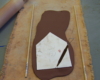 Cutting out a clay template