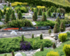 Three diesel locomotives on a garden railroad
