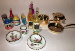Miniature cookware, plates, and other detail pieces