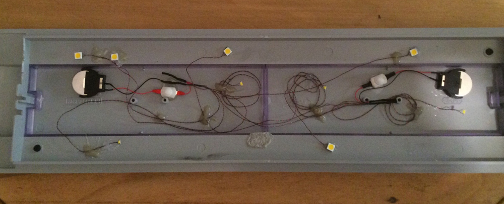 Ceiling of passenger car with wiring
