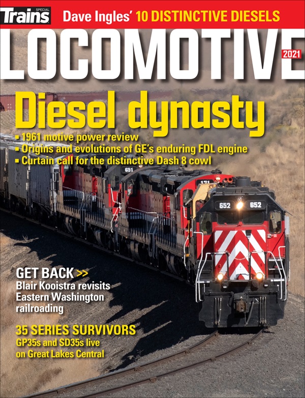 Image of magazine cover with a red locomotive.