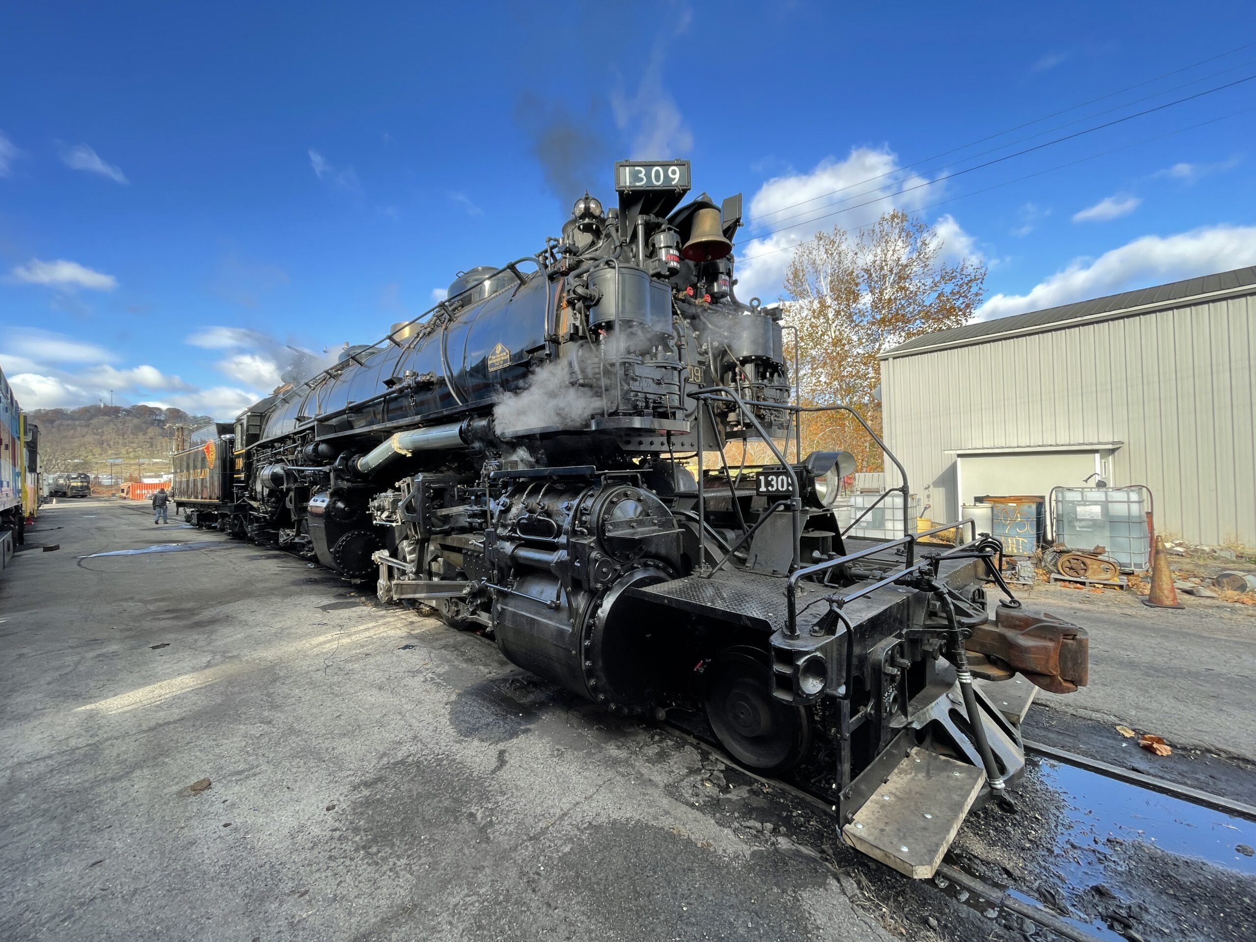 steam locomotive outside shop