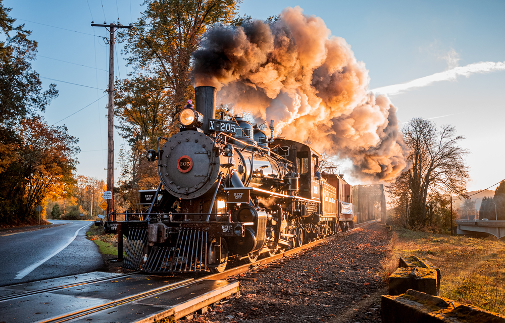 Steam engine crossing roadway