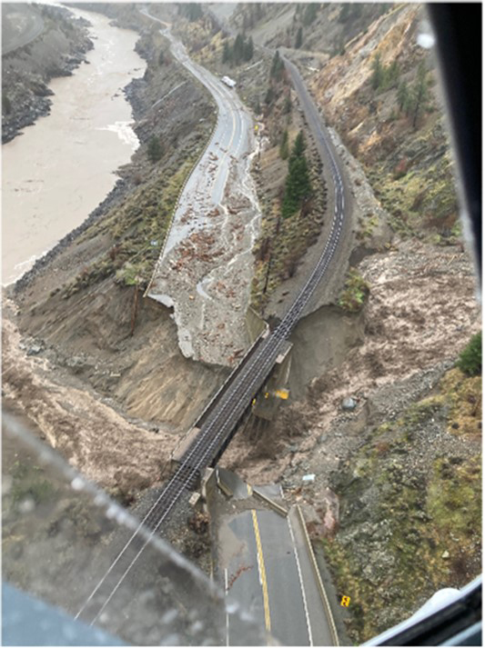 Railroad and highway washed out by flooding