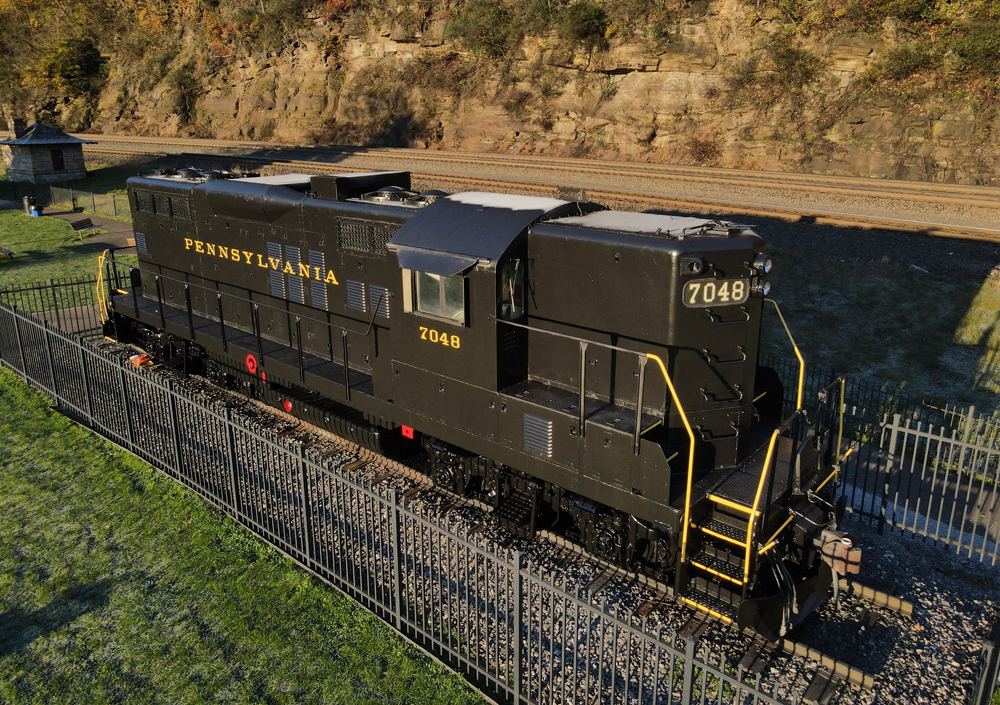 Freshly painted dark green locomotive with gold lettering