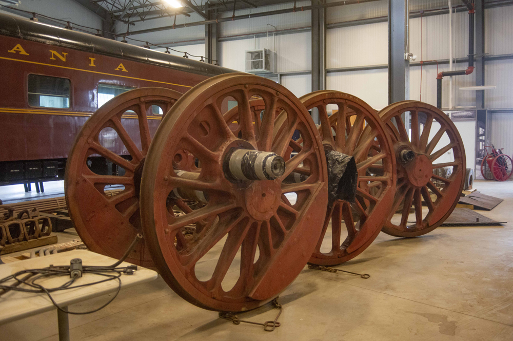 Driving wheels of locomotive sitting in buidling