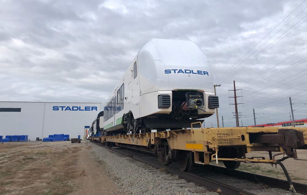 Passenger equipment on flatcar