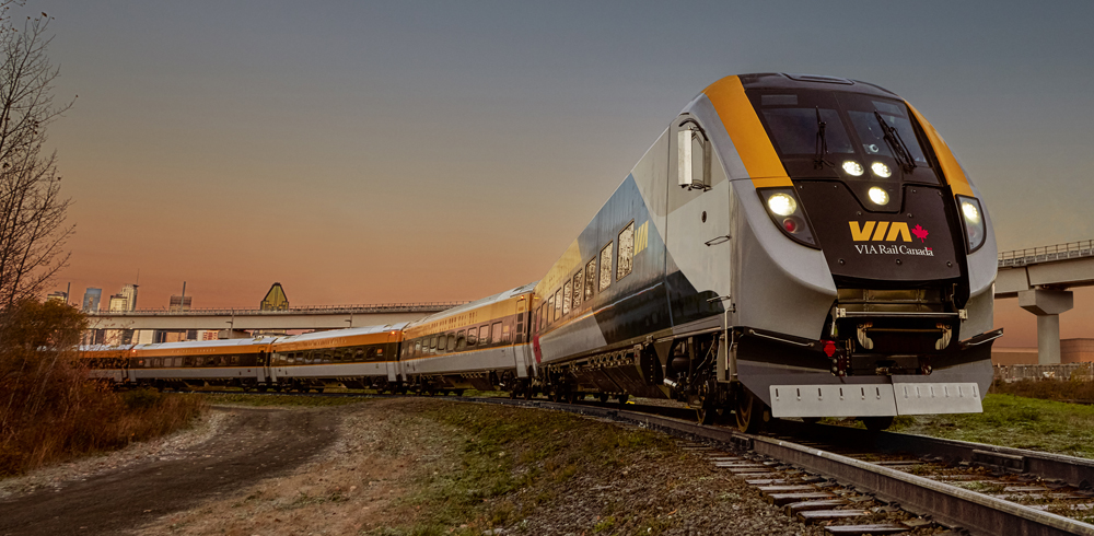 Passenger train on curve with cab car leading