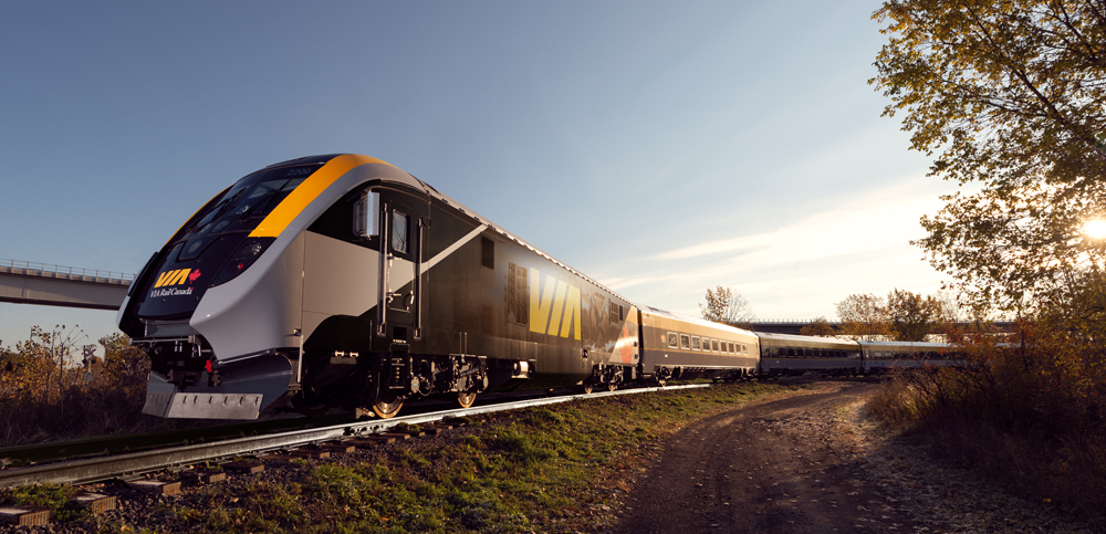 Locomotive and passenger train posed on curve