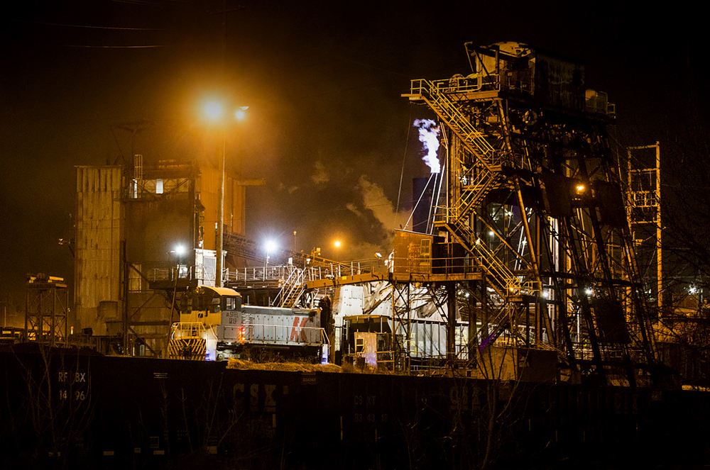 Switch engine at steel mill at night
