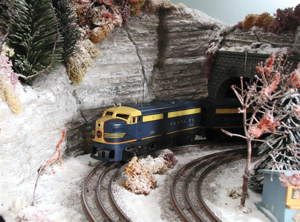 Toy trains in a holiday scene