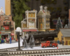 Model steam locomotive in holiday scene
