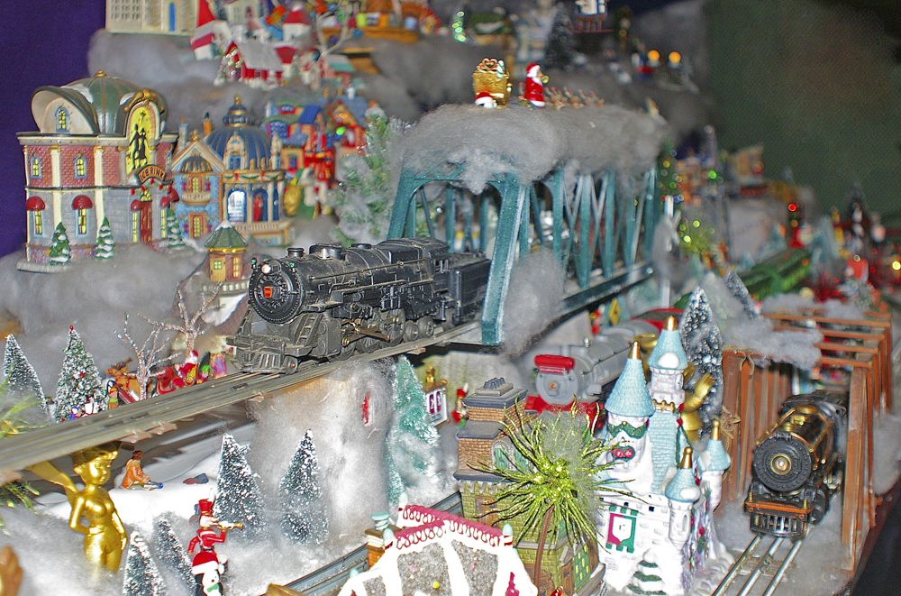 Toy trains near model structures