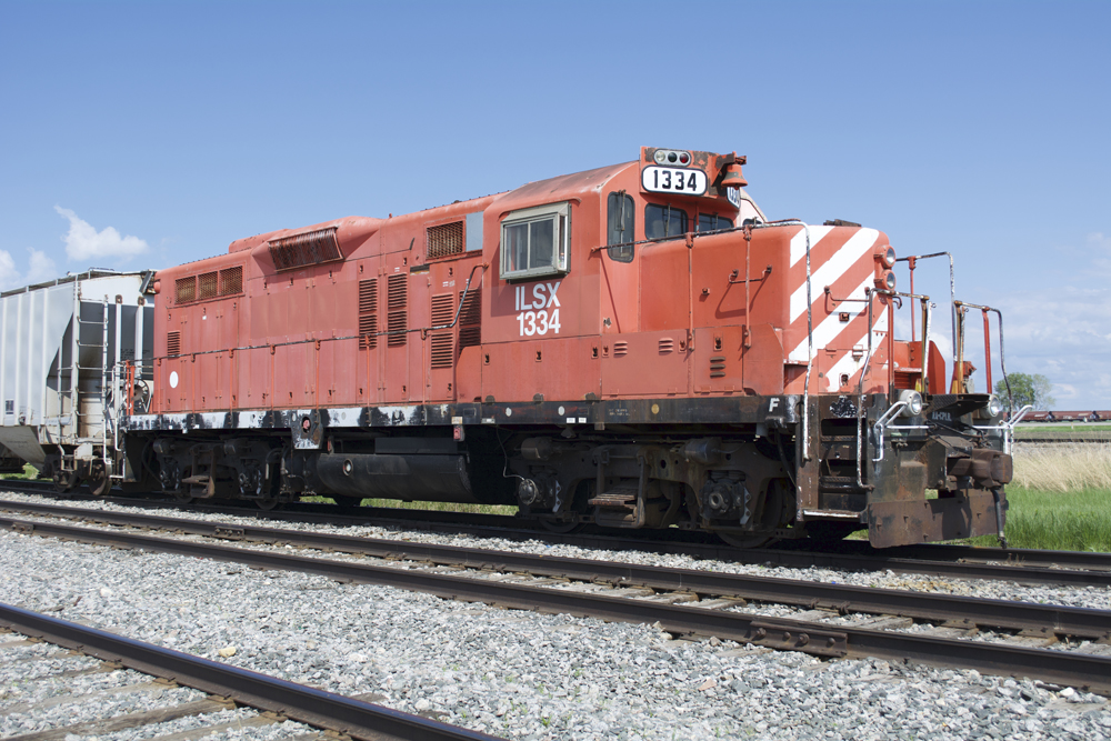 Roster shot of Independent Locomotive Service General Motors Diesel Division GP9 no. 1334 in CP Rail’s Action Red paint scheme at Crookston, Minn.