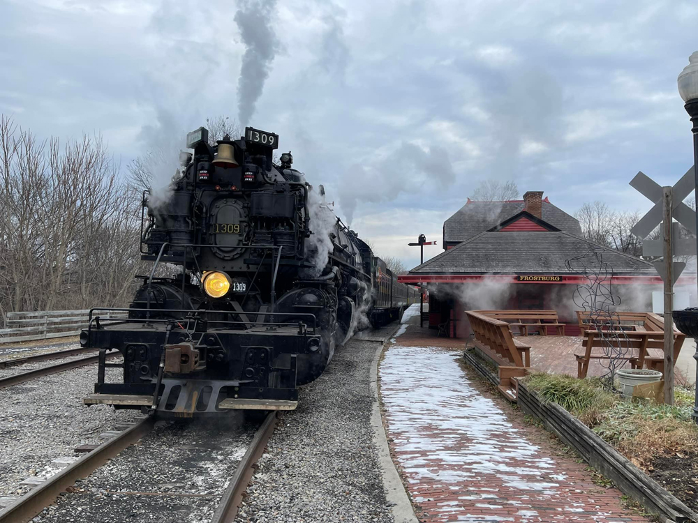 Steam locomotive at station