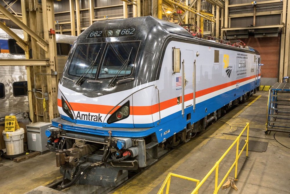 Amtrak electric locomotive with retro paint scheme
