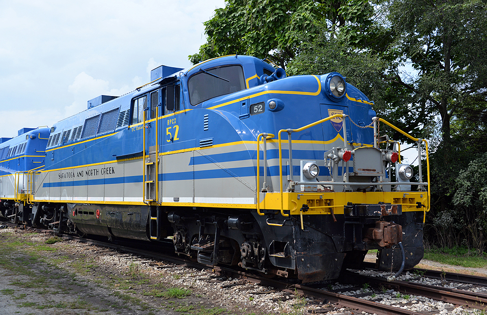 Blue and grey locomotive.