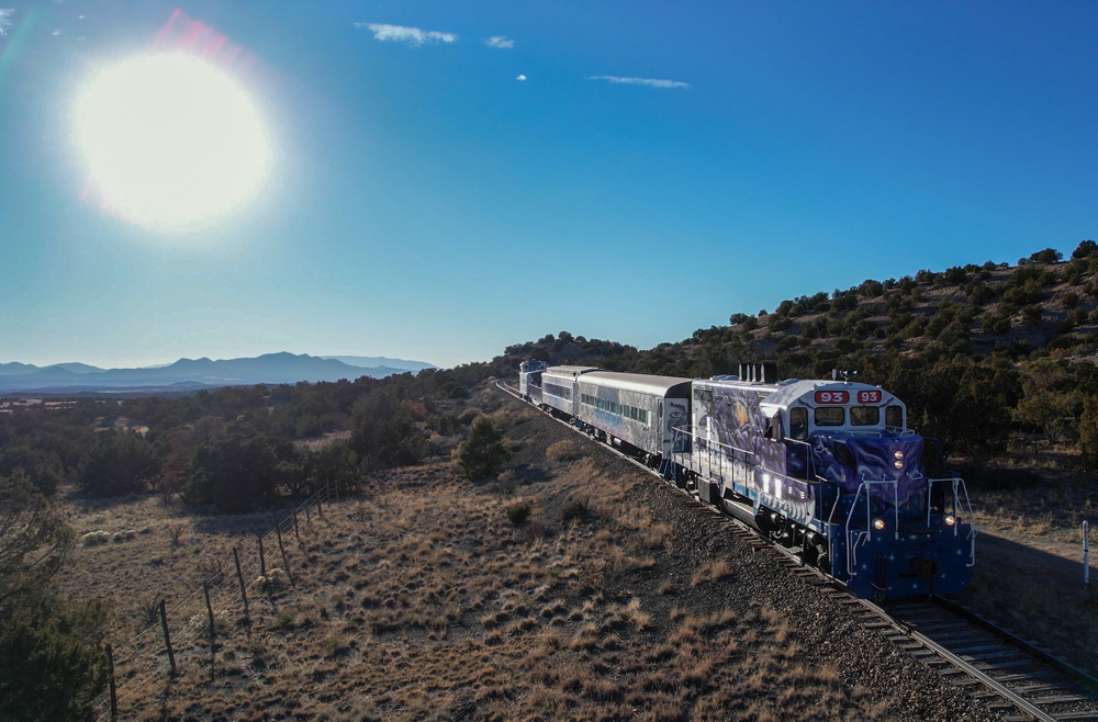 Train under sunny sky