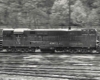 Pan shot of locomotive in yard