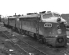 Streamlined diesel locomotives lined up in yard