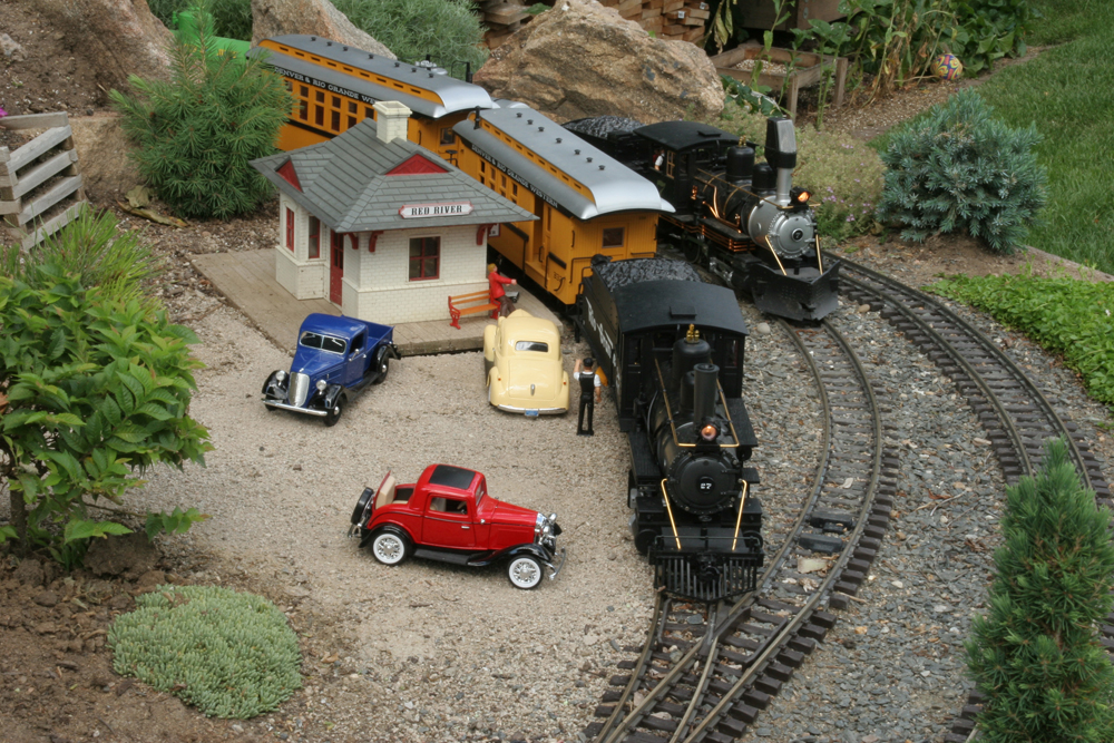 Two model trains at a model station