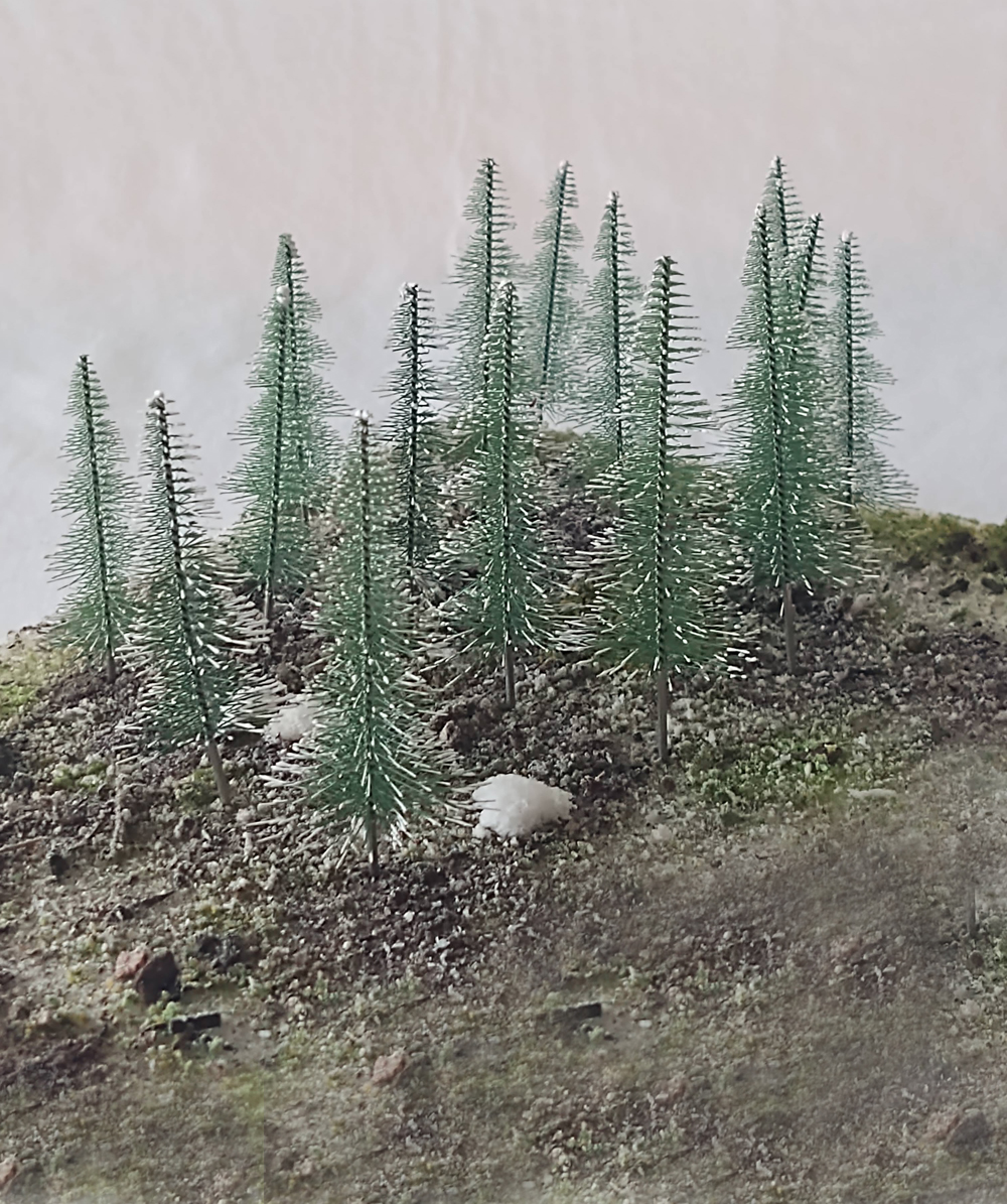 Rock Island Hobby assorted snow-covered pine trees.