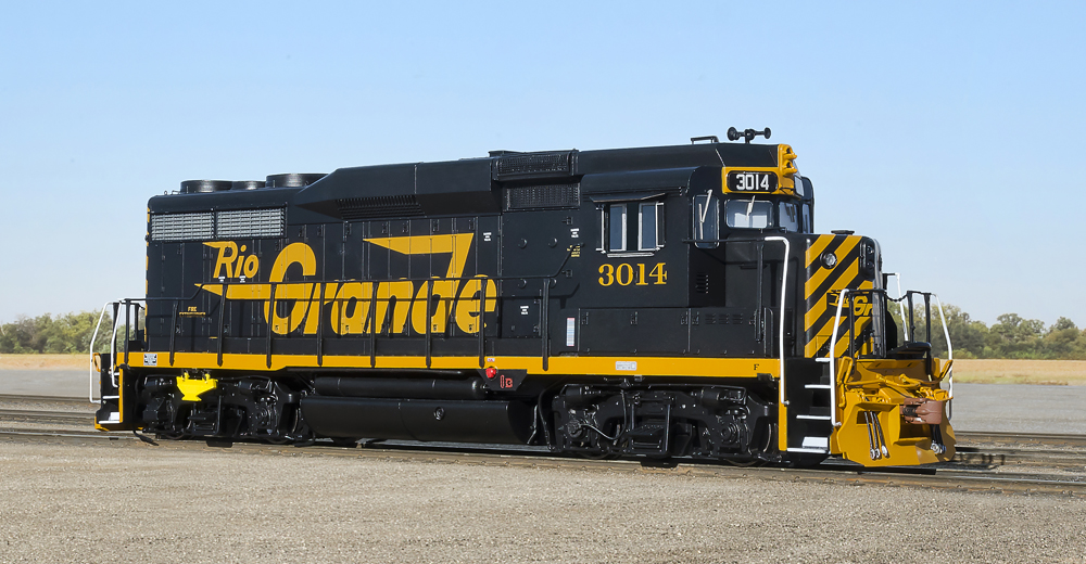Black and yellow-painted locomotive.