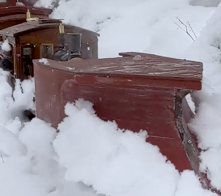 Locomotive plowing snow in Maine