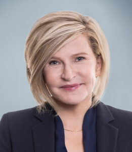 Head shot of woman with short blonde hair
