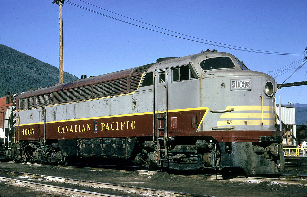 Maroon and gray Canadian Pacific diesel cab unit