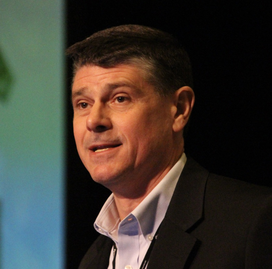 Man with dark hair in sport coat