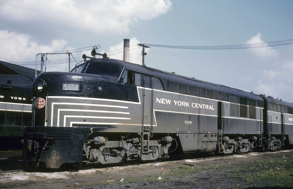 Black and gray cab unit with lightning-stripe paint scheme.