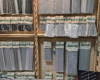 :] Display racks with packages of gray highway and parking lot sheets.