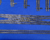 HO scale railroad track double crossover and section of flextrack.